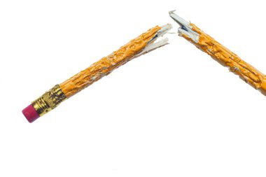 Horizontal shot of a chewed and broken pencil on a white background.  Copy Space. clipart