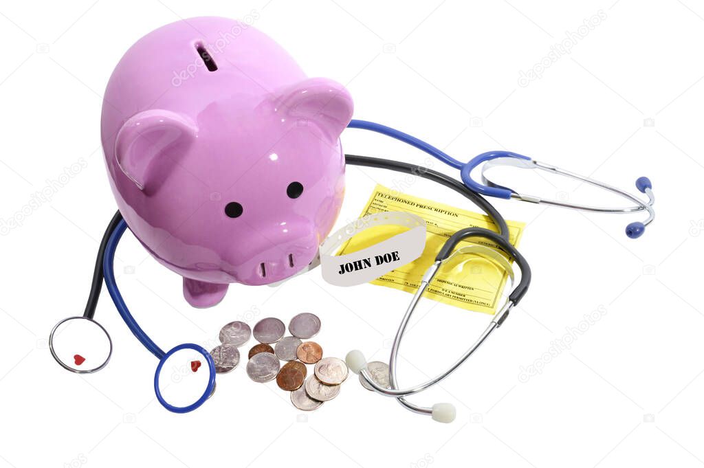 Horizontal shot of a pink piggy bank in the midst of coins, two stethoscopes, hospital bracelet, and a prescription pad.  White background.