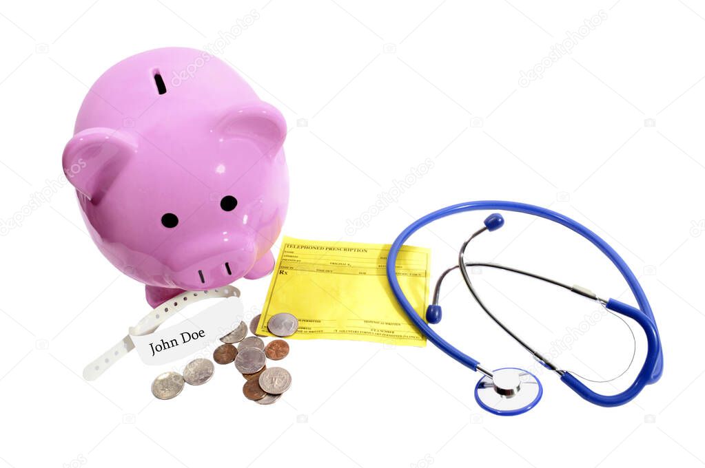 Horizontal shot of a pink piggy bank with a blue stethoscope, coins, and a prescription pad.  White background.