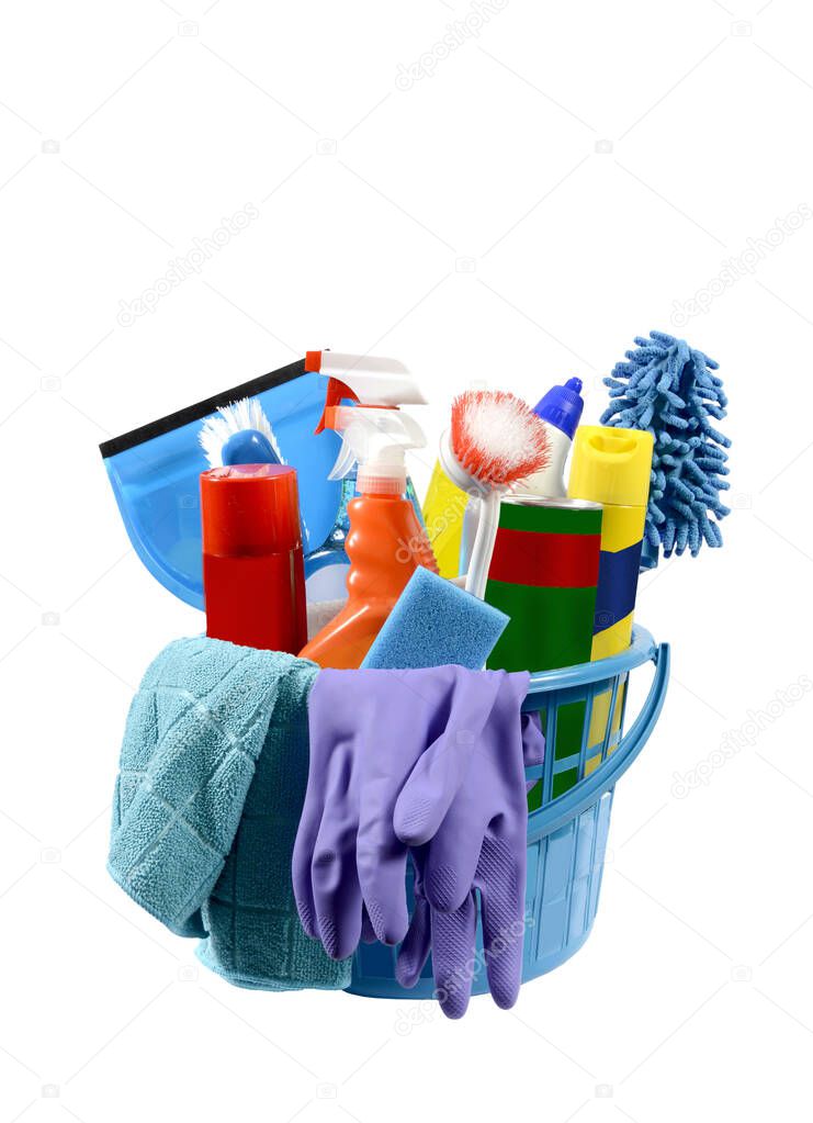 Vertical shot of a round blue plastic basket filled with cleaning supplies isolated on white.