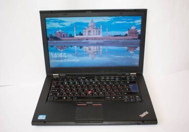 Lenovo black laptop lightweight modern processor on a gray background Kakhakhstan 01/03/2020 clipart