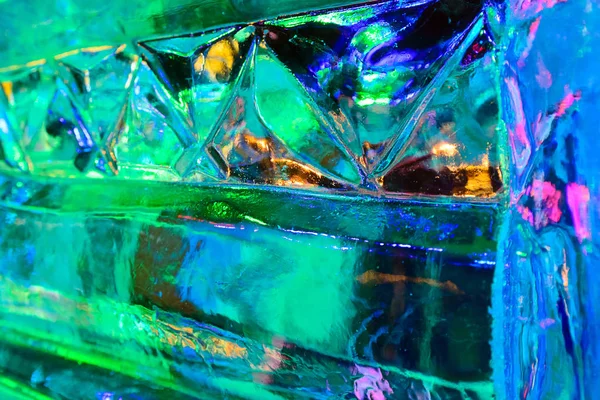 Colored ice face background, green blue, ice refraction, closeup, background for postcards — Stock Photo, Image