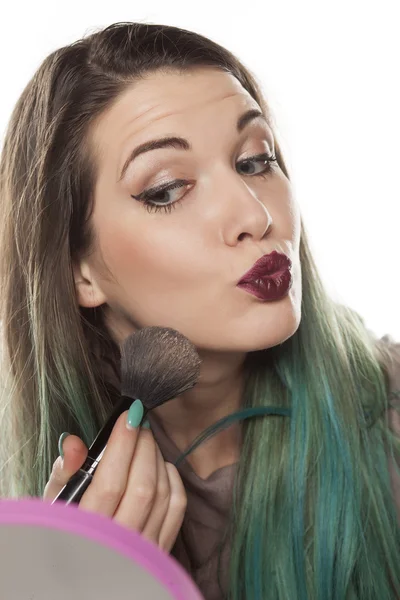Women applying makeup — Stock Photo, Image