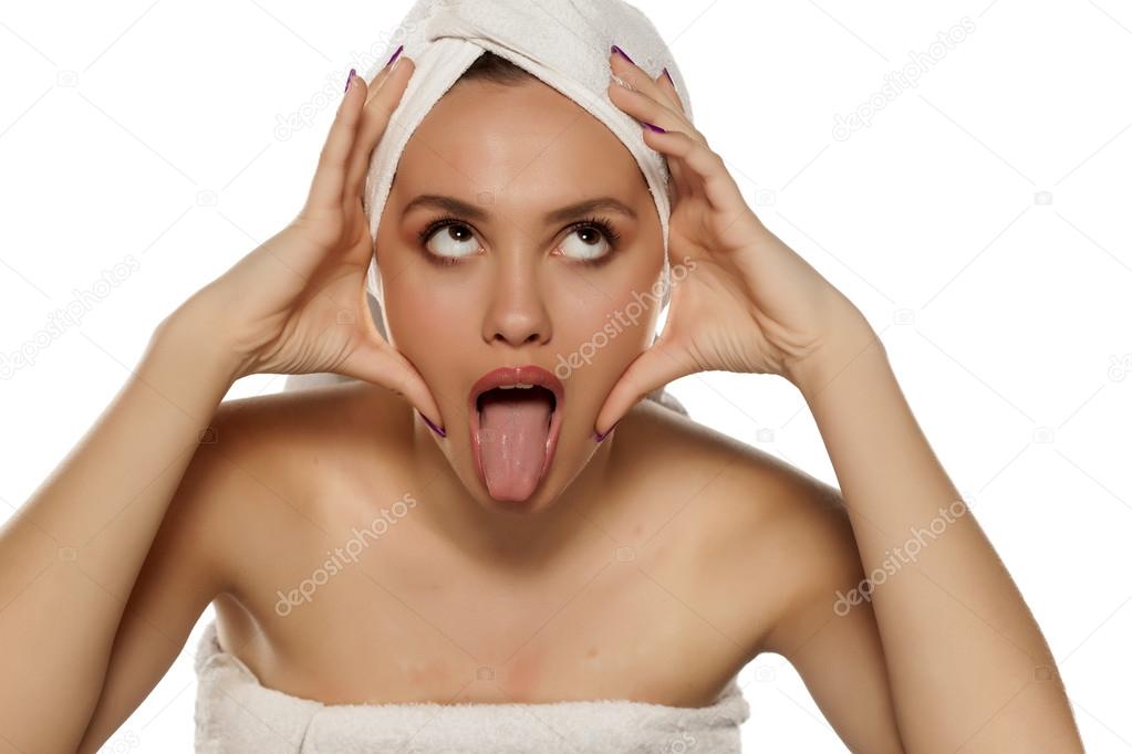 spa woman showing tongue