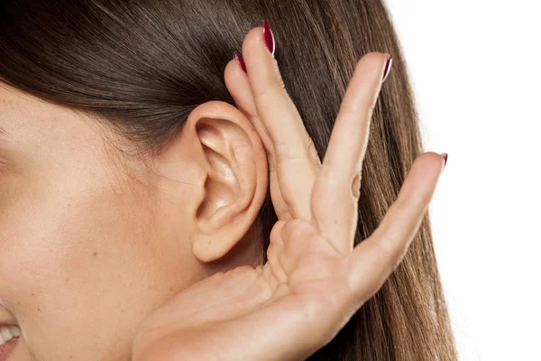 Palm behind an ear — Stock Photo, Image