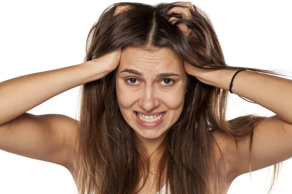 Woman with itchy scal — Stock Photo, Image
