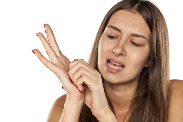 Woman with itchy palm — Stock Photo, Image