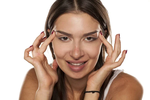 Woman tightening her face — Stock Photo, Image