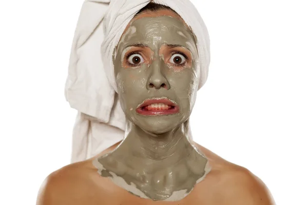 Woman with a mud mask — Stock Photo, Image