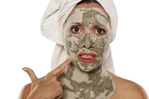 Woman with a mud mask — Stock Photo, Image