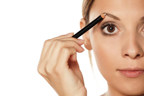 Mujer haciendo maquillaje —  Fotos de Stock