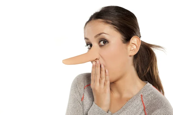 Women with pinocchio nose — Stock Photo, Image