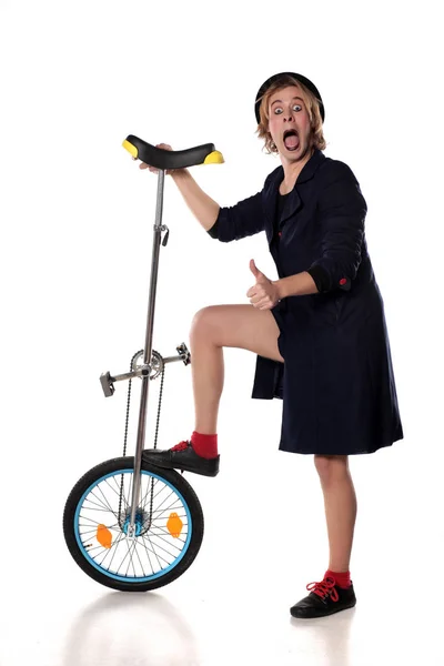 Palhaço com um monociclo — Fotografia de Stock