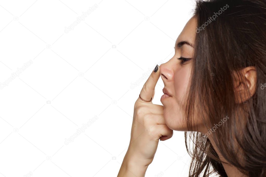 woman raising her nose 