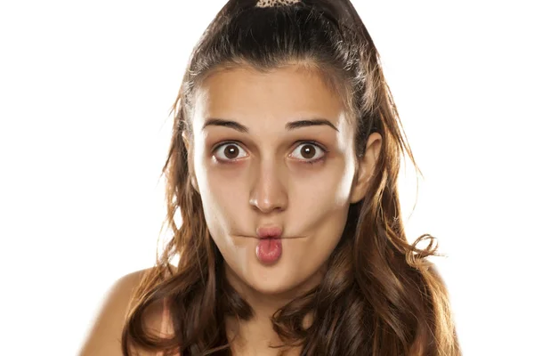 Woman making fish face — Stock Photo, Image