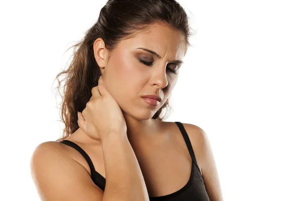 Жінка з болем в шиї — стокове фото