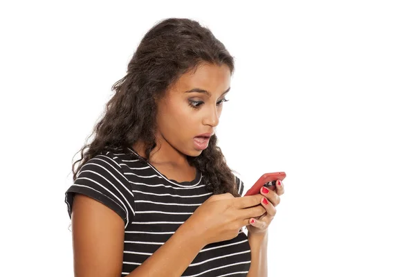 Girl with a smartphone — Stock Photo, Image