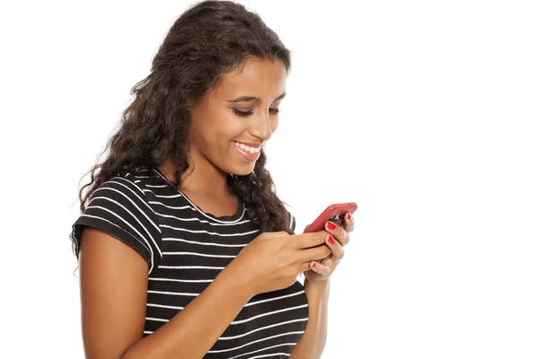 Girl with a smartphone — Stock Photo, Image