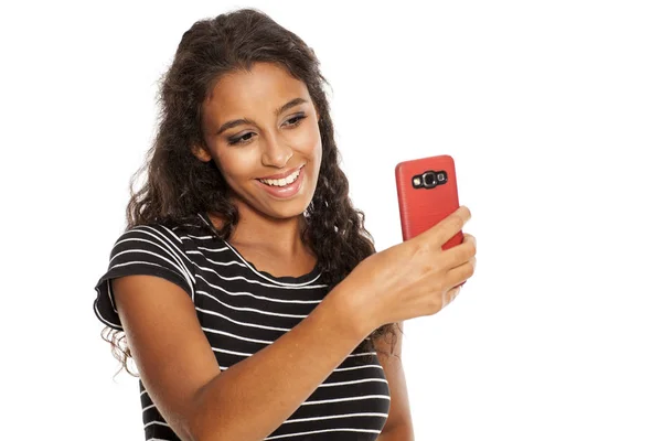 Girl with a smartphone — Stock Photo, Image