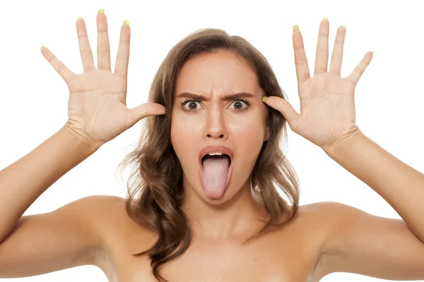 Young Woman Making Funny Faces Mocking — Stock Photo, Image