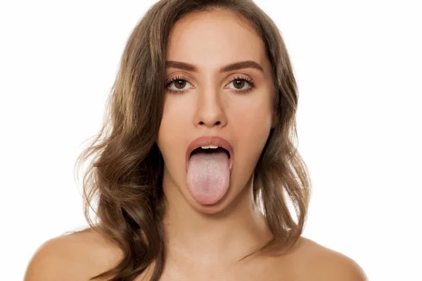 Young Beautiful Woman Showing Her Tongue — Stock Photo, Image