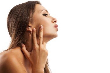 Woman touching her cheek