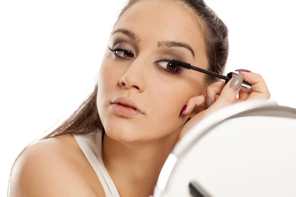 Young Beautiful Woman Applying Mascara Her Eyelashes — Stock Photo, Image