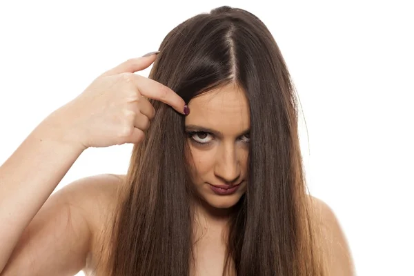 Young Beautiful Woman Peeking Her Long Straight Hair — Stock Photo, Image