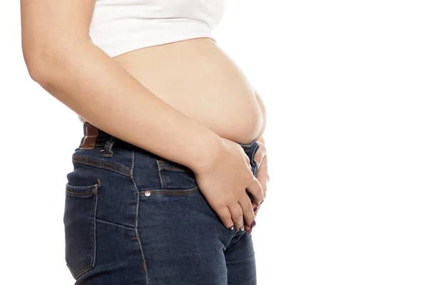 Woman Showing Her Bloated Stomach Eating — Stock Photo, Image