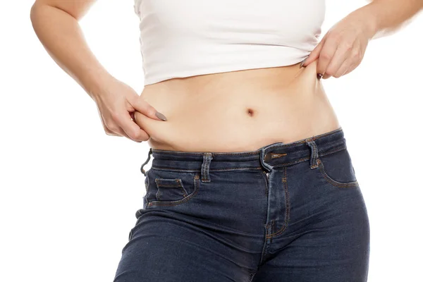 Woman Pinching Fat Deposits Her Waist — Stock Photo, Image