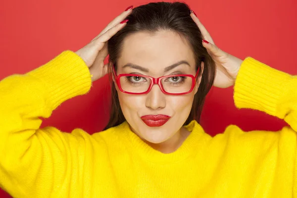 Beautiful Woman Red Frame Glasses Red Background — Stock Photo, Image