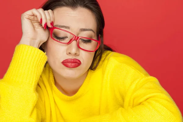 Beautiful Unhappy Woman Red Frame Glasses Red Background — Stock Photo, Image