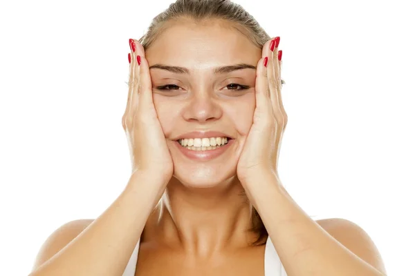 Young Smiling Woman Tightening Her Face Her Hands — Stock Photo, Image