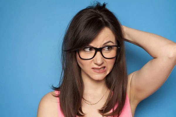 Young Confused Woman Eyeglasses Blue Background — Stock Photo, Image