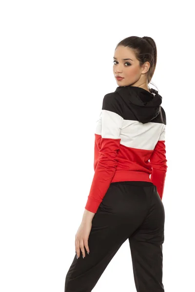 Young Beautiful Woman Black Red Tracksuits White Background — Stock Photo, Image
