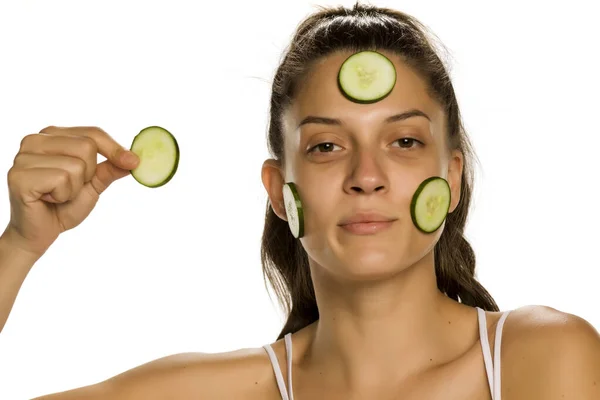 Young Smiling Woman Posing Slices Cucumbers Her Eyes White Background — Stock Photo, Image
