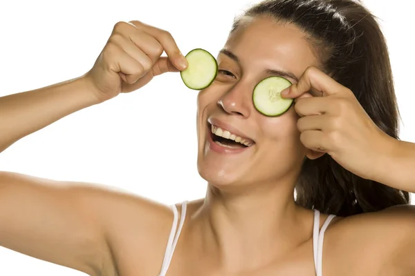 Young Smiling Woman Posing Slices Cucumbers Her Eyes White Background — Stock Photo, Image