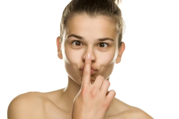 Young Funny Woman Touches Her Nose White Background — Stock Photo, Image