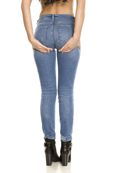 Woman Jeans Lifting Her Ass Her Hands White Background — Stock Photo, Image