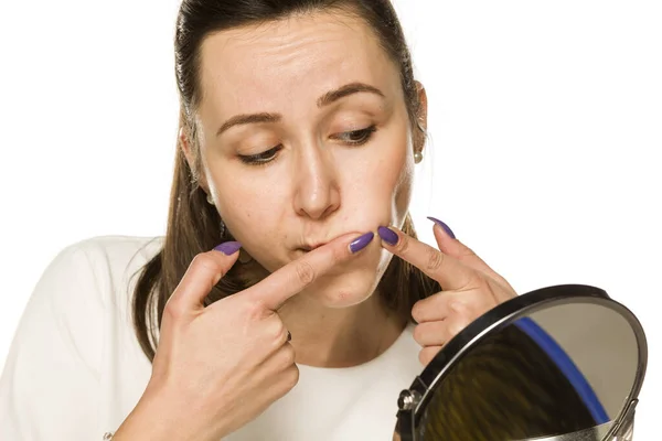 Young Woman Squeezing Acne White Background — Stock Photo, Image