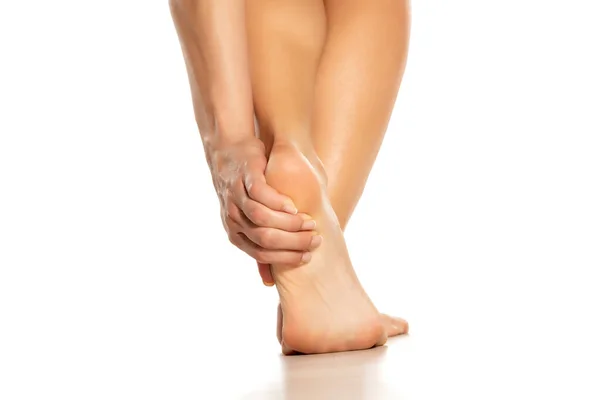 Woman Holding Her Painful Heel White Background — Stock Photo, Image