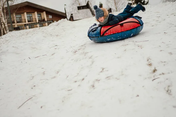 Male Child Sledding Tubing Bun Having Fun Winter — 스톡 사진