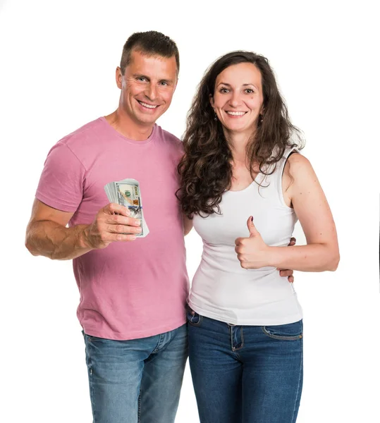 Uśmiechający się szczęśliwa para trzymając pieniądze Dolar — Zdjęcie stockowe