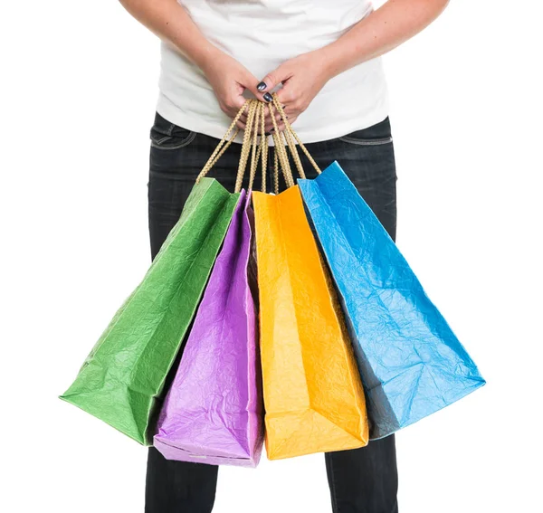 बहुरंगी शॉपिंग बैग पकड़ने वाली महिला — स्टॉक फ़ोटो, इमेज