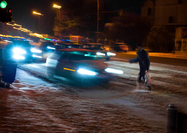Dangerous situation on zebra crossing at night.