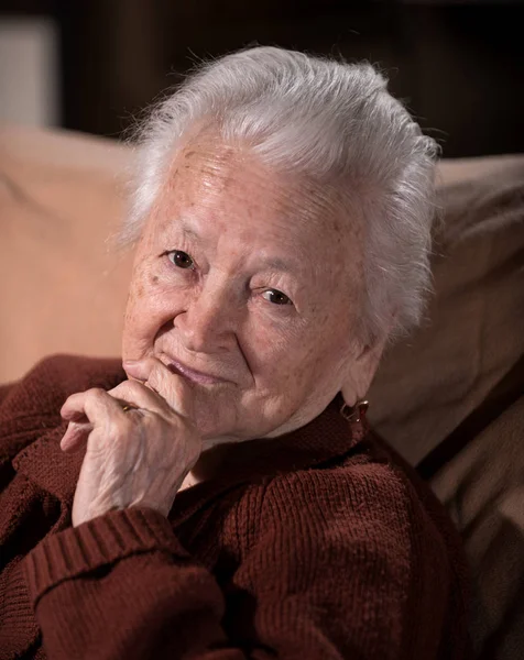 Portrait of smiling gray-haired old woman — Stock Photo, Image