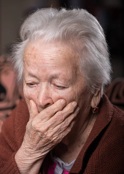 Portrait of old gray-haired sad woman — Stock Photo, Image