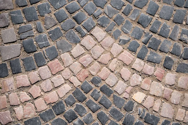 Kullerstensbelagda trottoaren med mönster — Stockfoto