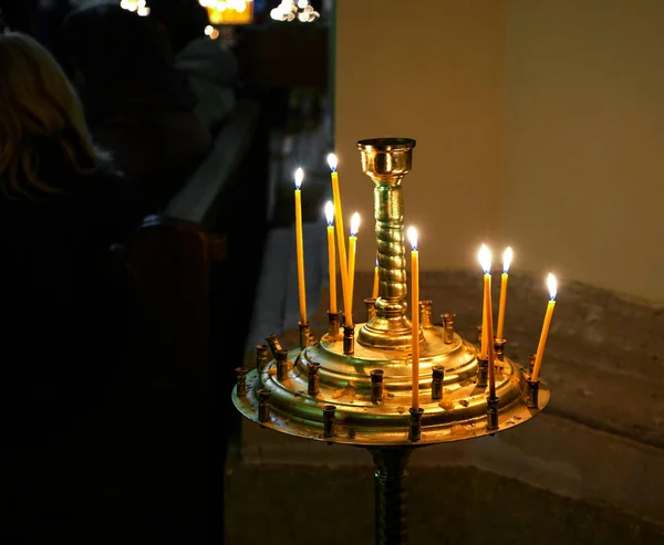 Burning candles in the church