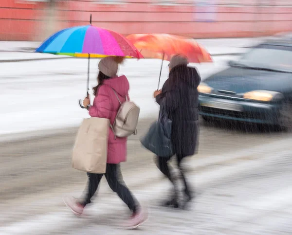 Dangerous situation on city roads on zebra crossing in winter ti Stock Picture